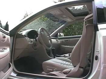 Solara interior showing moon roof glass closed with shade open